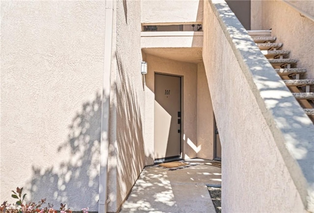 1040 Calle Del Cerro Unit 101, San Clemente, CA 92672 - doorway to property with stucco siding