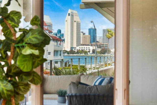 balcony with a city view and a water view