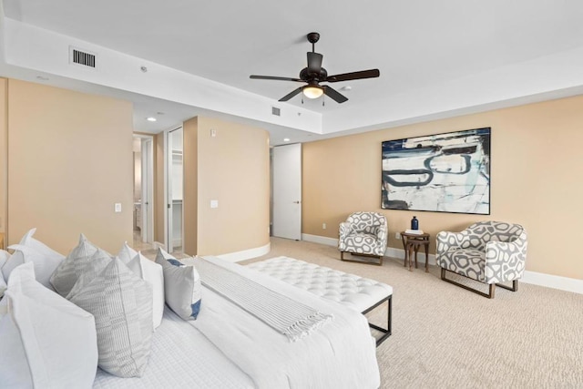 bedroom with light colored carpet, visible vents, recessed lighting, and baseboards