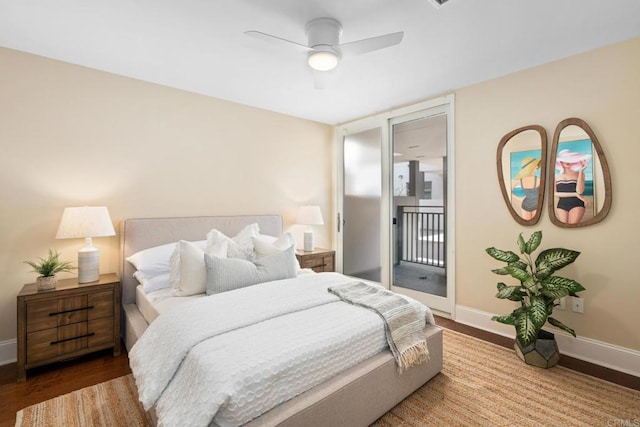 bedroom featuring wood finished floors, a ceiling fan, access to exterior, and baseboards