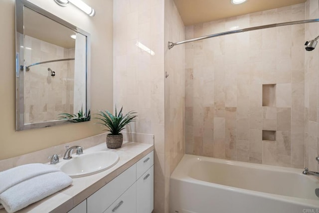 bathroom with shower / washtub combination and vanity