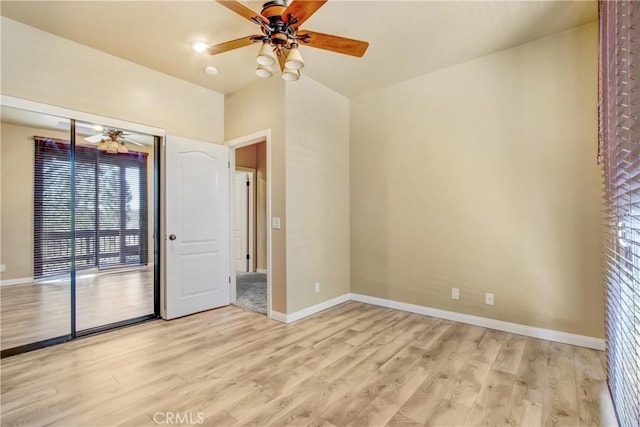26371 Spyglass Dr, Lake Arrowhead, CA 92352 - unfurnished bedroom featuring access to outside, baseboards, light wood finished floors, and ceiling fan
