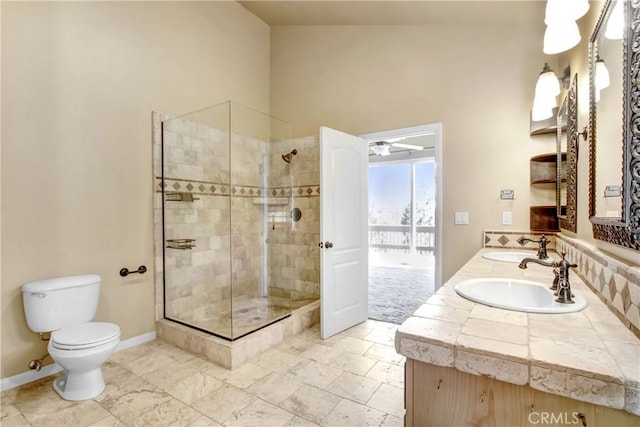 26371 Spyglass Dr, Lake Arrowhead, CA 92352 - full bath featuring a sink, toilet, tiled shower, and double vanity