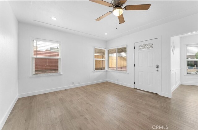 840 W 115th St, Los Angeles, CA 90044 - empty room featuring light wood-style flooring, ceiling fan, baseboards, and recessed lighting