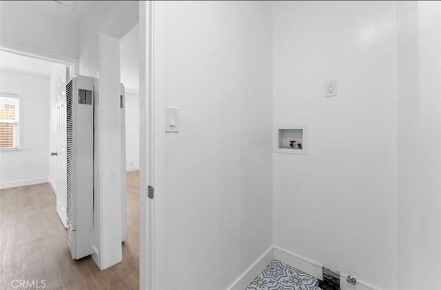 840 W 115th St, Los Angeles, CA 90044 - clothes washing area featuring a heating unit, washer hookup, baseboards, and wood finished floors