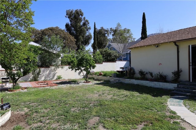 view of yard featuring fence