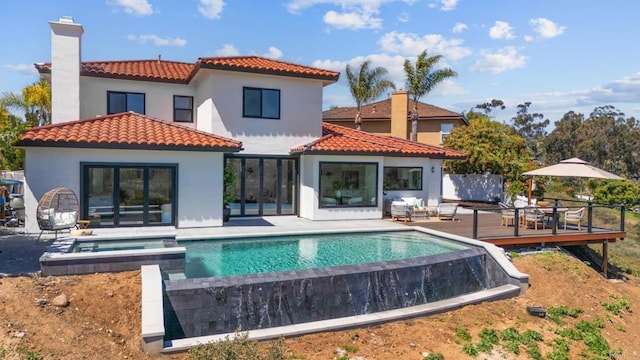 3792 Vista Pt, Bonita, CA 91902 - rear view of property with a deck, a tiled roof, a chimney, stucco siding, and a pool with connected hot tub