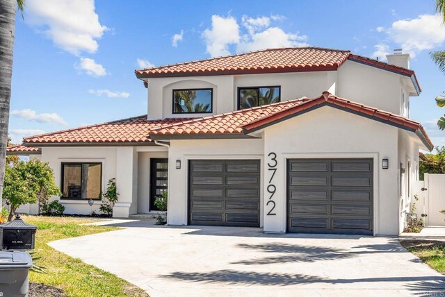 3792 Vista Pt, Bonita, CA 91902 - mediterranean / spanish-style house with a tiled roof, concrete driveway, stucco siding, a chimney, and an attached garage