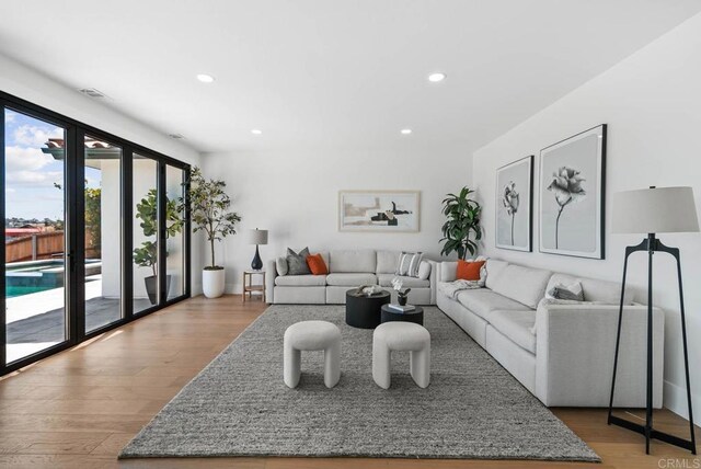 3792 Vista Pt, Bonita, CA 91902 - living room featuring wood finished floors and recessed lighting