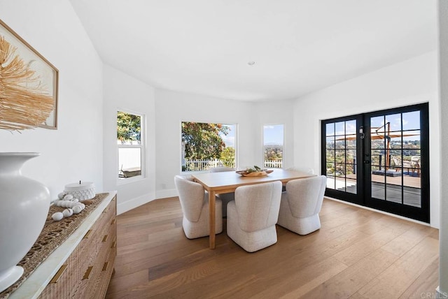 3792 Vista Pt, Bonita, CA 91902 - dining area with light wood-style flooring, french doors, healthy amount of natural light, and baseboards