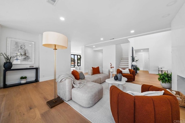 3792 Vista Pt, Bonita, CA 91902 - living room with wood finished floors, stairs, recessed lighting, and baseboards