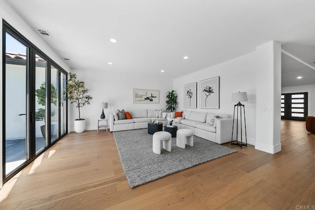 3792 Vista Pt, Bonita, CA 91902 - living room featuring light wood-type flooring, recessed lighting, and baseboards