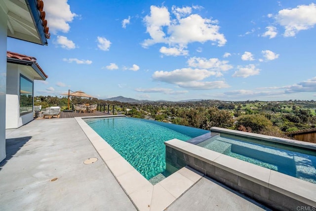 3792 Vista Pt, Bonita, CA 91902 - view of pool with a pool with connected hot tub, a patio area, and a mountain view