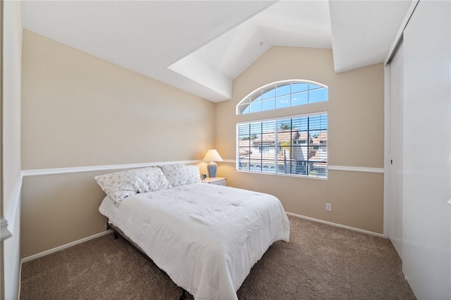 1525 Elegante Ct, Corona, CA 92882 - bedroom with carpet floors, vaulted ceiling, and baseboards