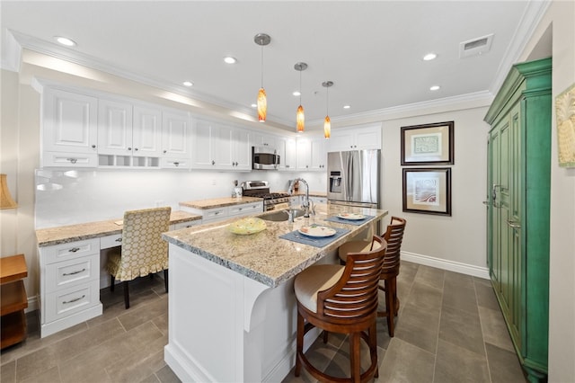 1525 Elegante Ct, Corona, CA 92882 - kitchen with appliances with stainless steel finishes, a sink, white cabinets, ornamental molding, and light stone countertops