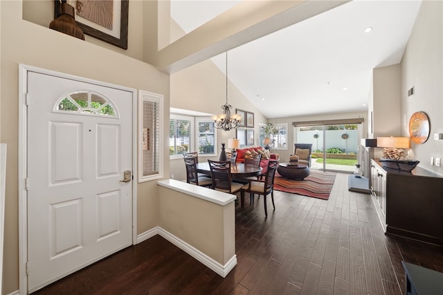 1525 Elegante Ct, Corona, CA 92882 - foyer with high vaulted ceiling, dark wood finished floors, a chandelier, healthy amount of natural light, and baseboards