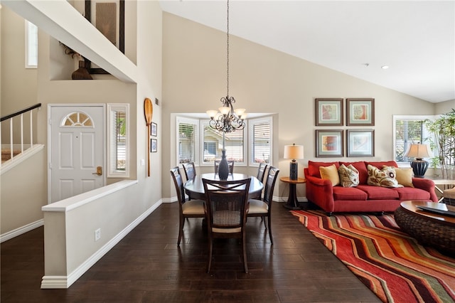 1525 Elegante Ct, Corona, CA 92882 - dining space with a chandelier, dark wood-type flooring, stairway, baseboards, and high vaulted ceiling