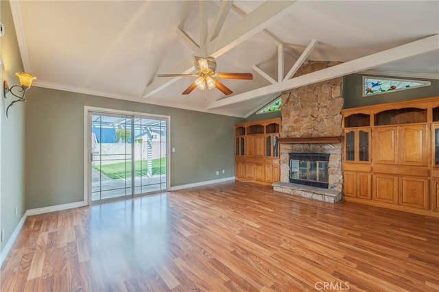 7041 Heil Ave, Huntington Beach, CA 92647 - unfurnished living room featuring vaulted ceiling with beams, light wood finished floors, baseboards, and a ceiling fan