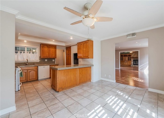 7041 Heil Ave, Huntington Beach, CA 92647 - kitchen featuring light tile patterned floors, white appliances, tasteful backsplash, visible vents, and a raised ceiling