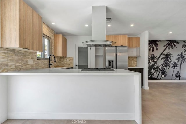 2175 N Sandra Rd, Palm Springs, CA 92262 - kitchen featuring a sink, light countertops, tasteful backsplash, appliances with stainless steel finishes, and recessed lighting
