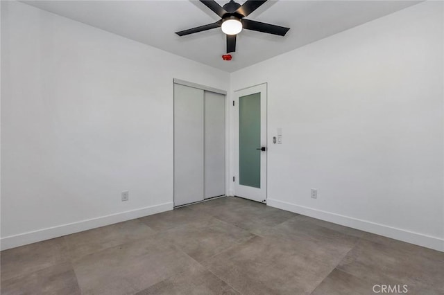 2175 N Sandra Rd, Palm Springs, CA 92262 - spare room with baseboards, ceiling fan, and finished concrete floors