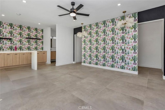 2175 N Sandra Rd, Palm Springs, CA 92262 - unfurnished living room with ceiling fan, recessed lighting, wallpapered walls, and baseboards
