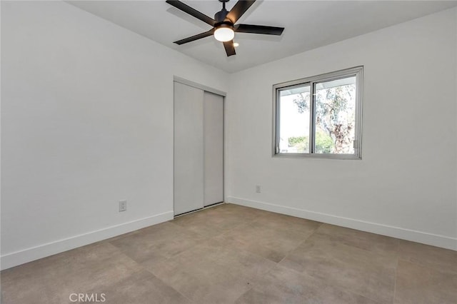 2175 N Sandra Rd, Palm Springs, CA 92262 - unfurnished bedroom with baseboards, a closet, and ceiling fan