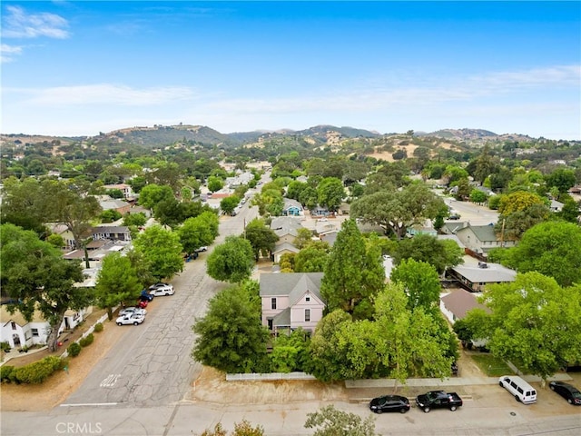 drone / aerial view featuring a mountain view and a residential view