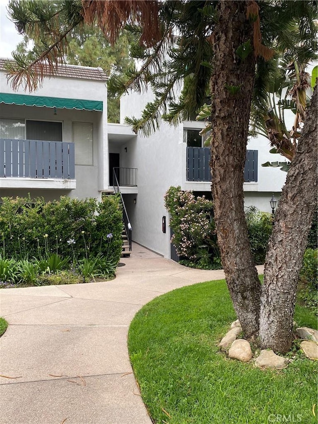view of property with stairway