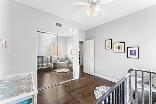 12475 Woodhall Way, Tustin, CA 92782 - bedroom with a closet, wood finished floors, baseboards, and a ceiling fan