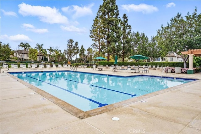 pool featuring a patio area