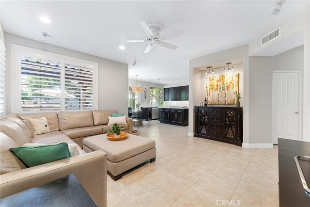 12475 Woodhall Way, Tustin, CA 92782 - living room featuring light tile patterned floors, ceiling fan, and recessed lighting