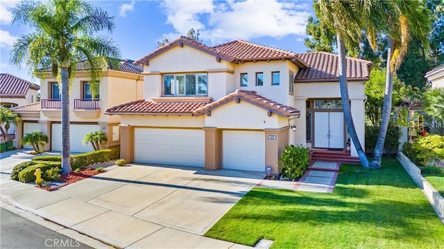 12475 Woodhall Way, Tustin, CA 92782 - mediterranean / spanish-style house with an attached garage, a tiled roof, driveway, and stucco siding