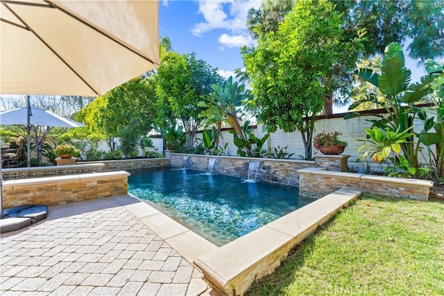 view of pool with a patio area, a fenced backyard, and a fenced in pool