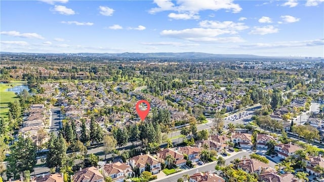 birds eye view of property featuring a mountain view and a residential view
