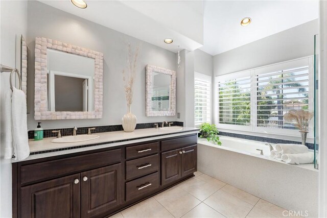 12475 Woodhall Way, Tustin, CA 92782 - full bathroom with tile patterned floors, a bath, double vanity, and recessed lighting