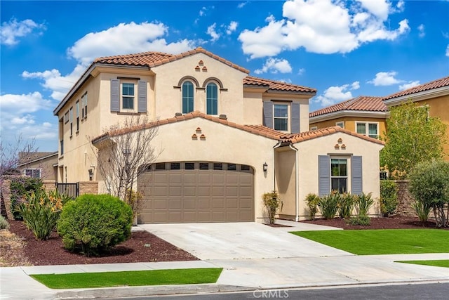 6014 Amora Dr, Chino Hills, CA 91709 - mediterranean / spanish house featuring a tiled roof, driveway, stucco siding, and a garage