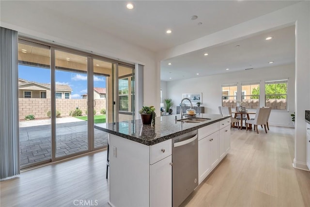 6014 Amora Dr, Chino Hills, CA 91709 - kitchen featuring light wood-type flooring, an island with sink, white cabinets, dishwasher, and a sink