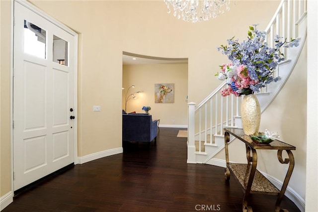 608 Chaparral Ct, Altadena, CA 91001 - foyer with baseboards, wood finished floors, a notable chandelier, and stairway