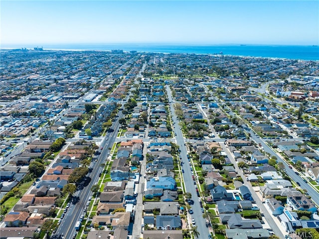 aerial view featuring a residential view and a water view