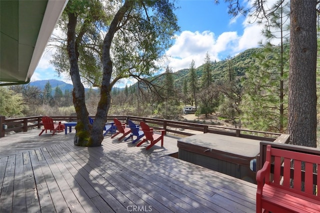 40957 Shandee Ln, Ahwahnee, CA 93601 - wooden terrace with a forest view, a mountain view, and a covered hot tub