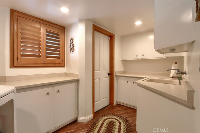 40957 Shandee Ln, Ahwahnee, CA 93601 - laundry area with wood finished floors, a sink, cabinet space, and recessed lighting