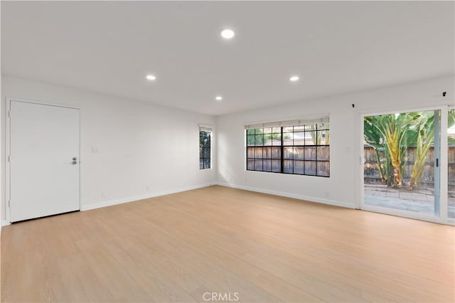 1651 S Juniper Unit 217, Escondido, CA 92025 - spare room featuring recessed lighting, light wood finished floors, and baseboards
