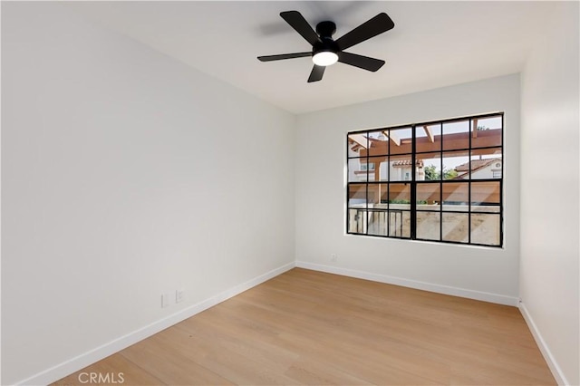 1651 S Juniper Unit 217, Escondido, CA 92025 - unfurnished room featuring light wood-style flooring, baseboards, and ceiling fan