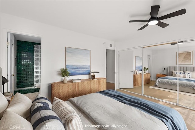 1651 S Juniper Unit 217, Escondido, CA 92025 - bedroom featuring a closet, a ceiling fan, and ensuite bathroom