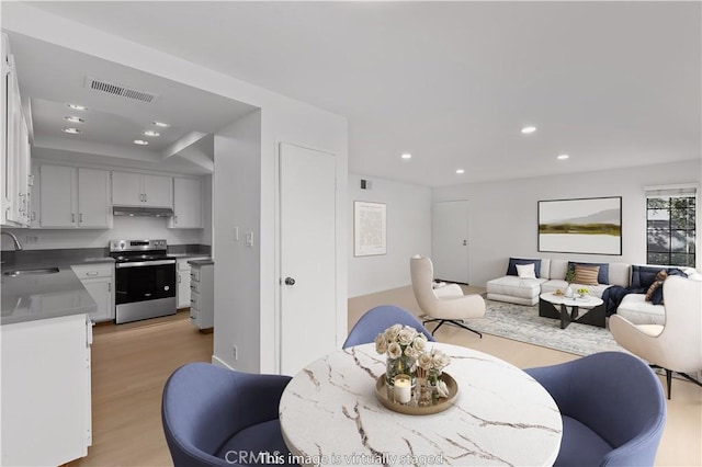 1651 S Juniper Unit 217, Escondido, CA 92025 - dining room with light wood-style flooring and recessed lighting