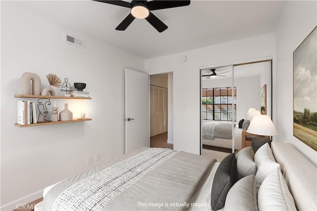 1651 S Juniper Unit 217, Escondido, CA 92025 - bedroom featuring a closet, ceiling fan, and baseboards