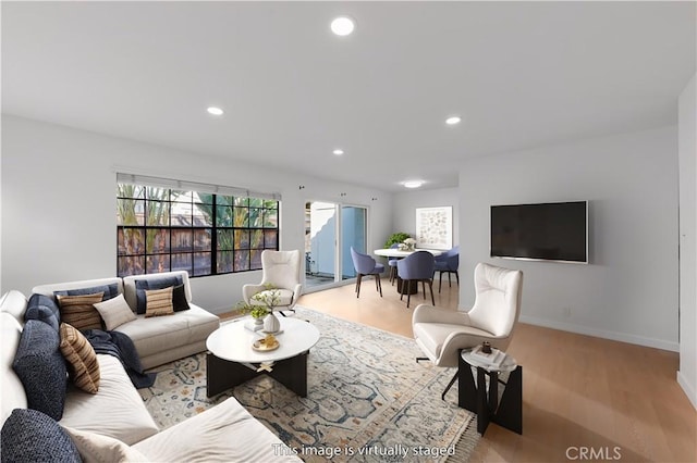 1651 S Juniper Unit 217, Escondido, CA 92025 - living area featuring wood finished floors, recessed lighting, and baseboards