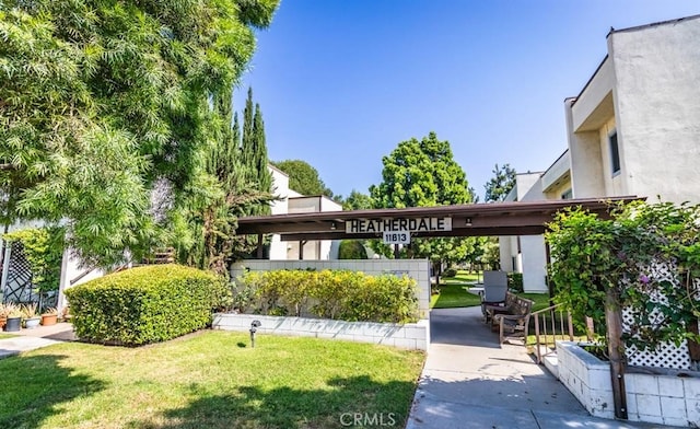 surrounding community with a lawn