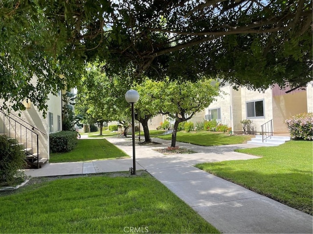 surrounding community with a lawn